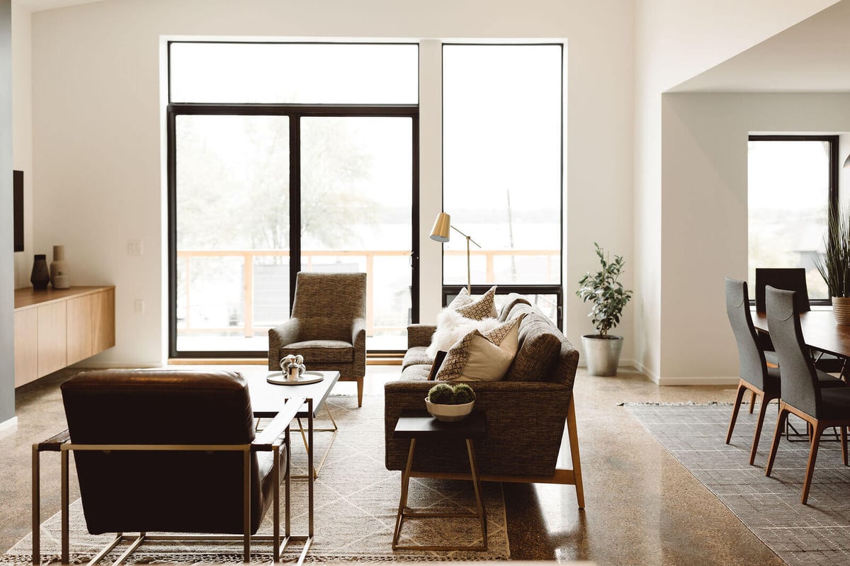 Bright living and dining area in a custom home by R Value Homes in West Michigan