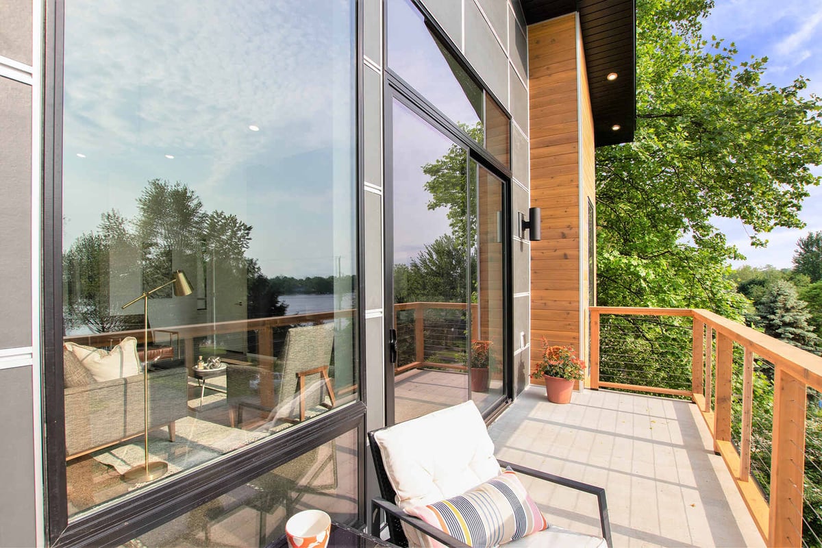 Outdoor balcony with scenic views in a custom home by R Value Homes, West Michigan